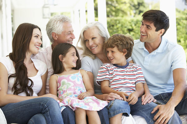 42396667 - extendend family sitting in garden